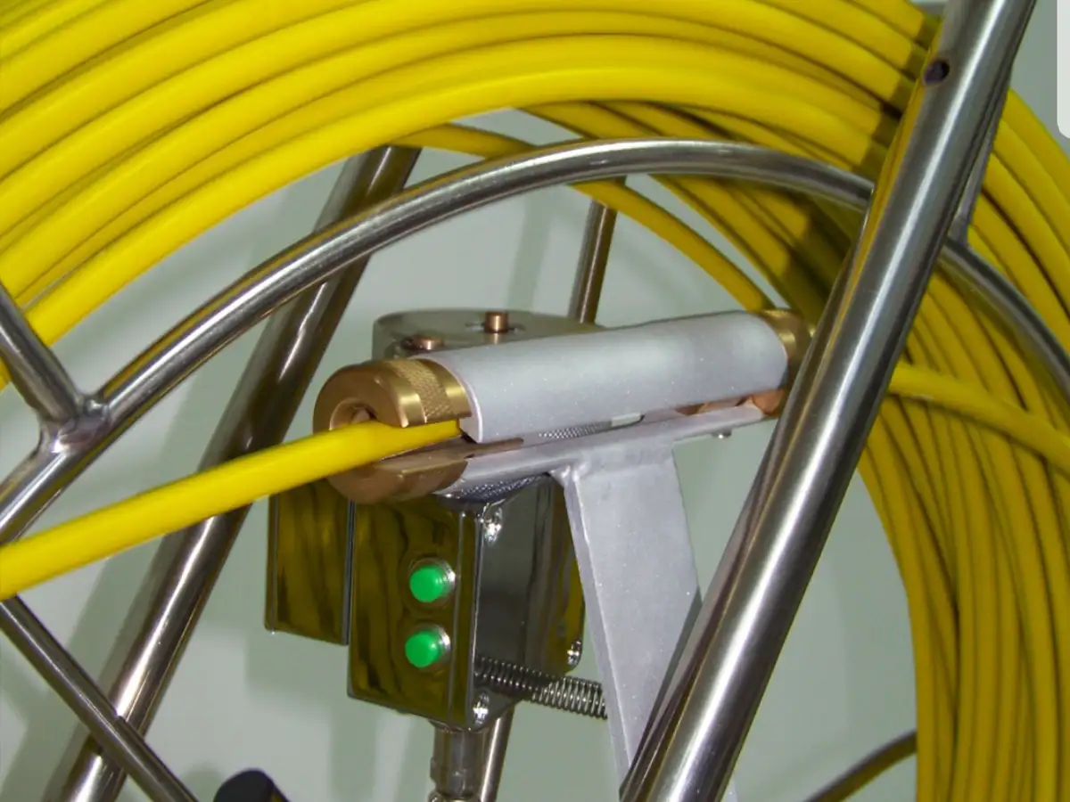 Drain inspection camera reel with yellow push cable, used for CCTV drain inspections in Whangarei